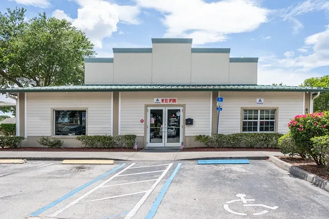 Self storage office building with on-site management and customer parking